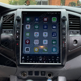 &nbsp;Introducing The Workshop 12 Tesla Style Screen for the Toyota Tacoma

The Workshop 12 Ultra-Wide Screen is the perfect Plug and Play solution for your 2005-2015 Toyota Tacoma! Equipped with a 12.1" HD&nbsp; display and wireless Apple CarPlay and Android Auto. Tons of storage with 128GB internal space and 8GB RAM for the smooth performance you deserve. We've made sure that your steering wheel controls work perfectly with our unit and don't worry about losing your factory reverse camera as our unit work